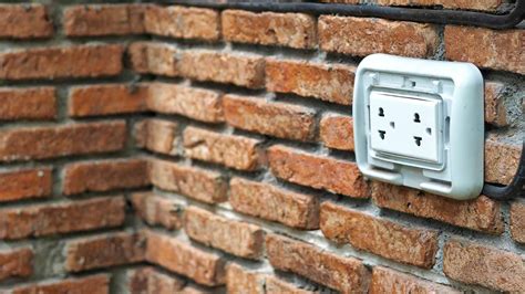 brick wall outlet mounting